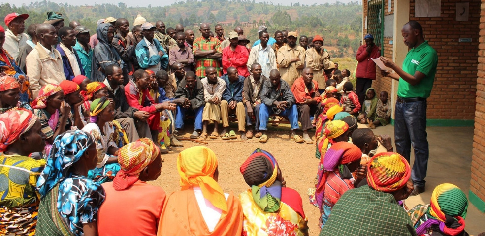 Sustainable Coffee Review Top Score 90 Points. Photo of Village meeting.