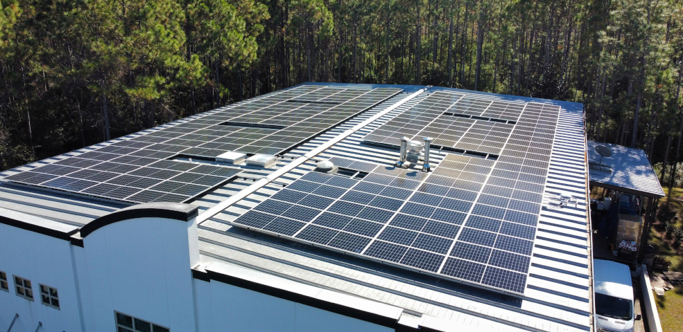 Amavida Coffee Roasters Solar Panels on Rooftop at their roaster in Santa Rosa Beach, FL.